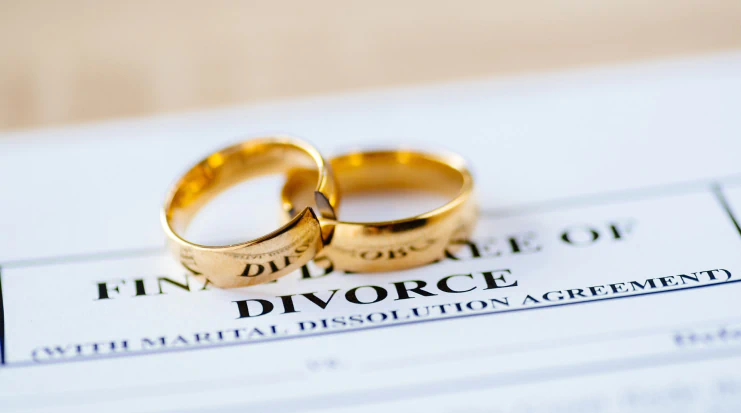 divorce apapers and wedding rings